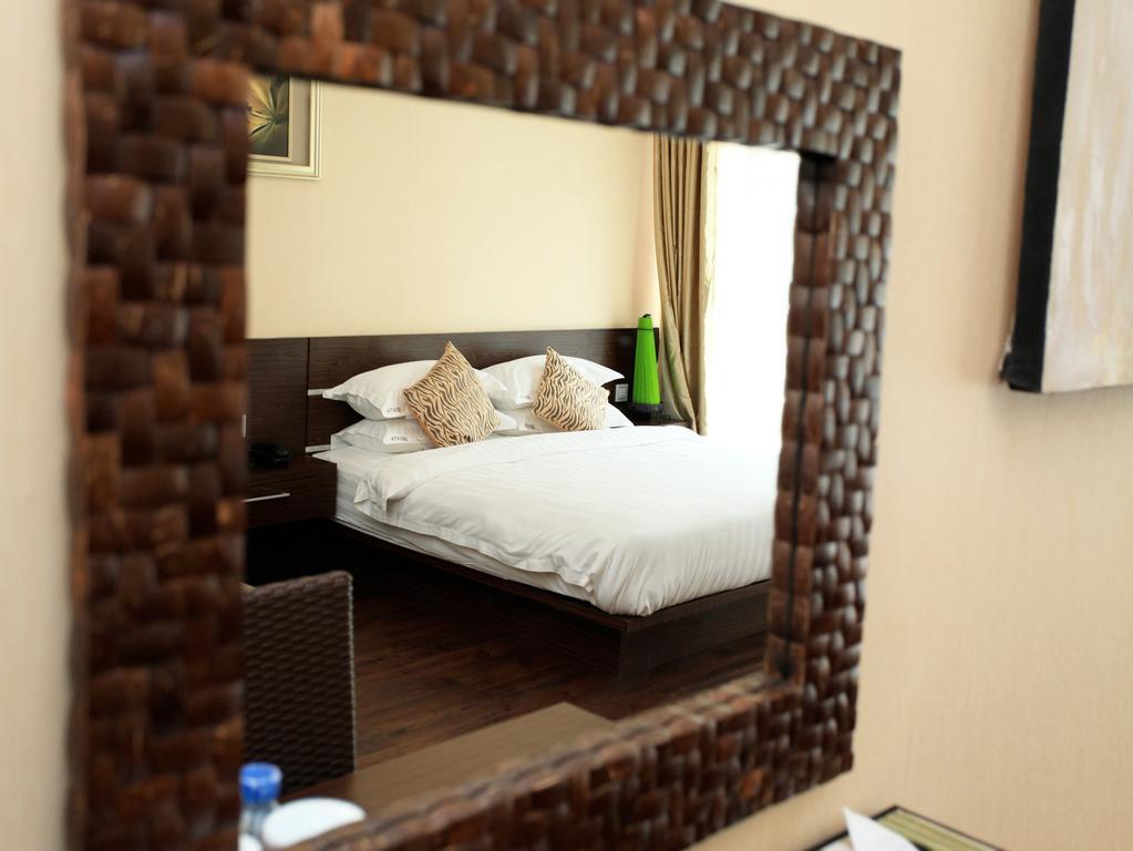 Devata Suites And Residence Легіан Номер фото